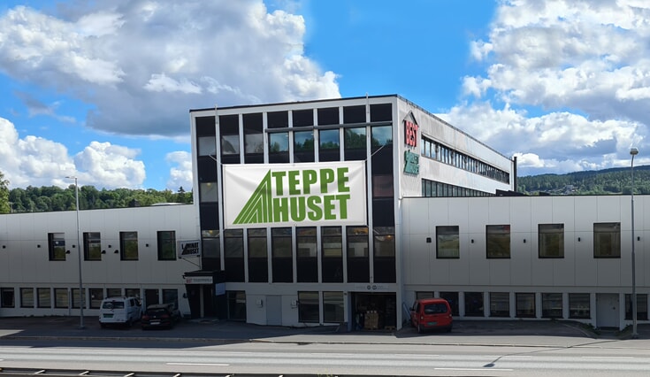 Fra parkett til plysj? Vi bytter navn til Teppehuset!
